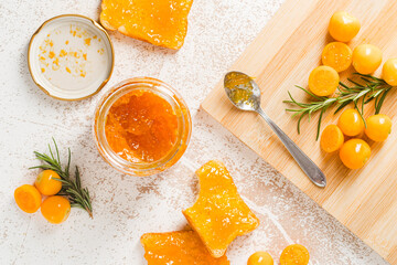 Cape gooseberry jam on white rustic background
