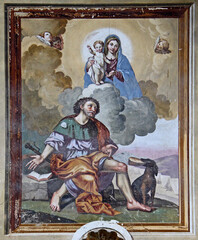 Madonna e San Rocco; affresco sulla facciata della chiesetta di San Rocco a Riva Valdobbia (Valsesia)