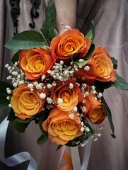 Wedding bouquet of orange roses