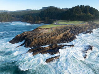 The Pacific Ocean washes against the rocky and rugged coastline of Oregon, not far south of Lincoln City. This part of the Pacific Northwest coast is incredibly scenic and accessed from highway 101.