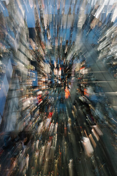 Abstract motion blur photo of people reflections in urban NYC