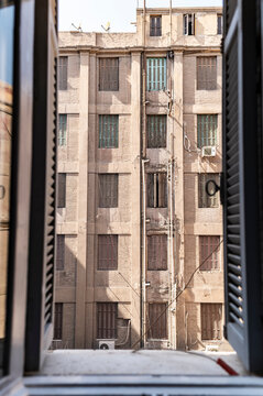Building facade with shutters in Cairo, Egypt