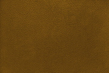 Natural, genuine solid yellow leather texture close up, macro. Structure of matte leatherette, artifical skin surface with embossing pattern. Background, wallpaper, backdrop