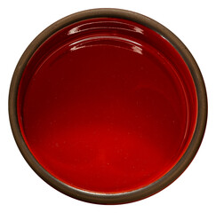 Round red plate with a glossy finish isolated on white background. Ideal for food, design, or...