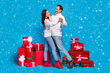 Full length body size view of nice affectionate cheerful couple dancing december occasion isolated over bright blue color background