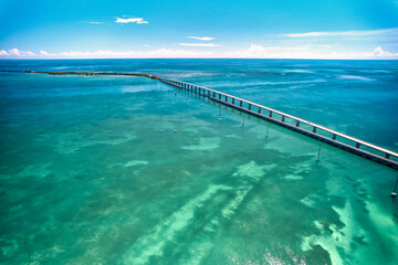 Aerial Drone image of the Overseas Highway and the magnicent clear turquoise waters of the Florida Keys between Lower Matecumbe Key Islamorada and Layton near Long Key