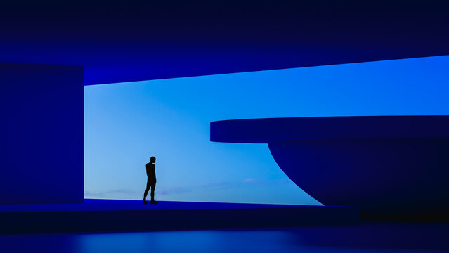 Silhouette of a man exploring futuristic architecture at twilight