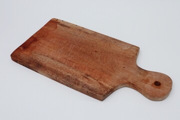 Wooden cutting boards are commonly used for cutting groceries and food displays