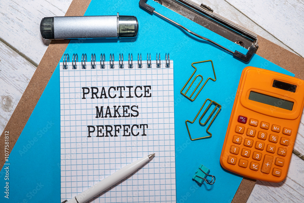 Poster practice makes perfect text written on a notebook with pencils