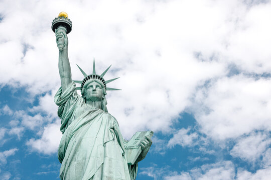 Statue of Liberty against a blue sky in New York