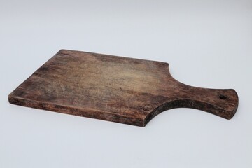 Wooden cutting boards are commonly used for cutting groceries and food displays