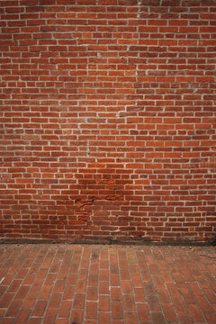 Red Brick Wall and Sidewalk
