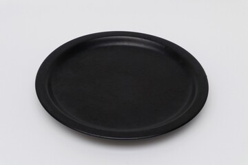 Black plate on white background