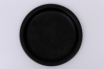 Black plate on white background