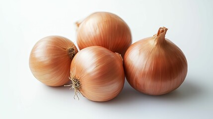 Four Whole Brown Onions on a White Surface