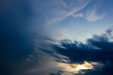 big clouds in the sky before the storm at sunset