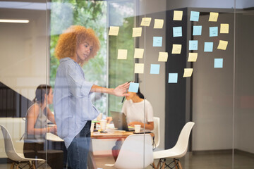 Team brainstorming in modern office