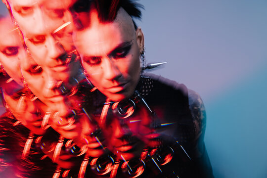 Abstract portrait with red light refraction and punk style elements