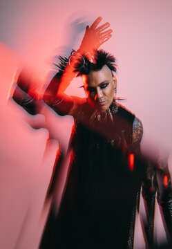 Edgy punk fashion portrait with dramatic lighting effects