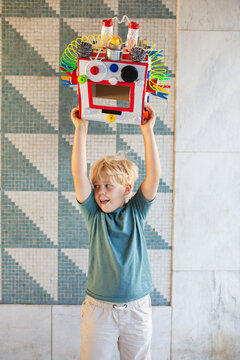Boy dressed DIY robot mask 