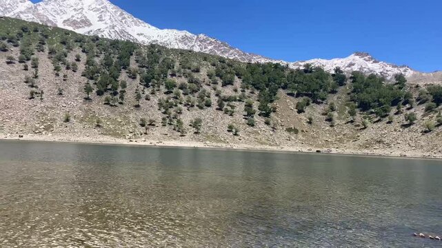Rama lake in Rama Meadows in Gilgit baltistan, Pakistan. Rama lake Timelapse with Nanga Parbat snow mountain in GB, Pakistan