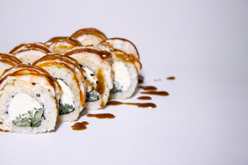 sushi Japanese meals with rice nori salmon shrimp mango avocado on white background