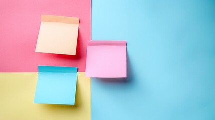 Fototapeta premium Sticky notes in pink, blue, and yellow, placed on a vibrant pastel-colored background, minimalistic flat lay design, creative stationery for organization, bold and colorful workspace.