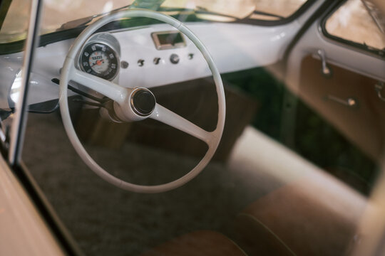 Interior view of a vintage car steering wheel