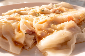 angle view traditonal Cantonese food of cheong fun or rice noodle rolls or steamed vermicelli rolls horizontal composition