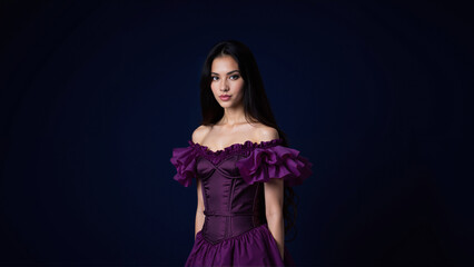 Fototapeta premium Elegant Woman in Deep Purple Off-Shoulder Dress