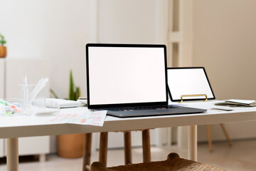 blank laptop and tablet screens