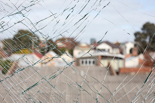 Looking through broken and cracked window glass