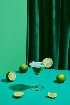 Refreshing Lime Martini on a Stylish Green Background