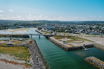 Matane River flowing in from the St Larence River, Matane, Quebec, Canada.