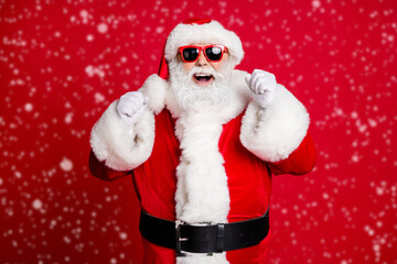 Portrait of his he nice handsome cheerful cheery lucky bearded Santa father having fun celebrating...