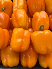 Orange peppers (capsicum) on display 