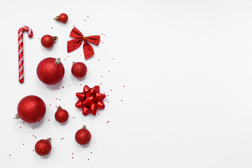 Beautiful composition with Christmas balls and confetti on white background