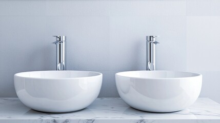 Two modern, rounded white sinks with sleek chrome faucets against a textured gray wall, creating a minimalist bathroom aesthetic.