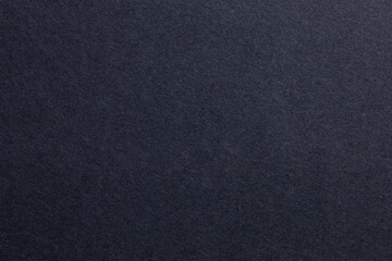 A black background with a lot of texture, textured origami paper backdrop