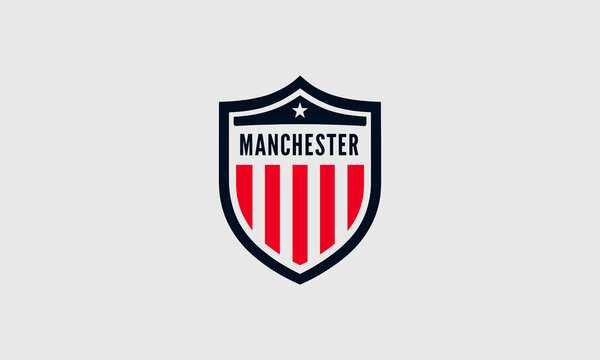 Shield emblem with "Manchester" and red stripes.