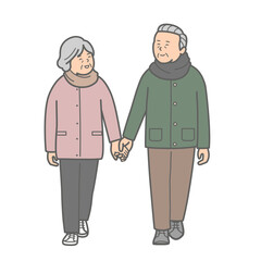 手を繋いで歩く冬服のシニアカップル