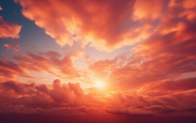 Fototapeta premium A vibrant sunset with dramatic clouds and warm colors illuminating the sky.