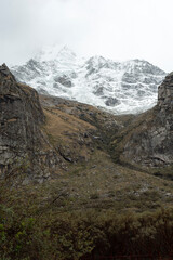 Beautiful snow-capped Huascaran seen from the turquoise Andean lagoon Chinancocha or Llanganuco