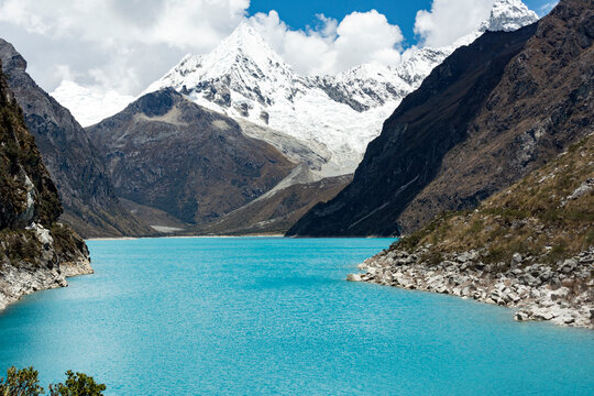 Beautiful turquoise lagoon in the Peruvian Andes called Laguna Paron