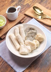 Pempek or empek-empek is a savoury Indonesian fishcake delicacy, made of fish and tapioca, from Palembang, South Sumatera, Indonesia. Pempek is served with rich sweet and sour sauce called cuko