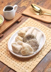Pempek or empek-empek is a savoury Indonesian fishcake delicacy, made of fish and tapioca, from Palembang, South Sumatera, Indonesia. Pempek is served with rich sweet and sour sauce called cuko