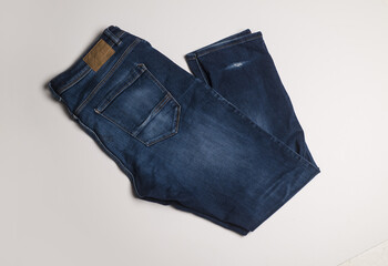 Pair of jeans. Blue denim pants. Denim jeans trousers pants. Denim texture for backdrop. Denim...