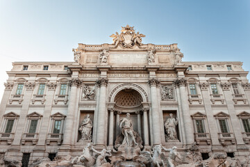 The Trevi Fountain (Fontana di Trevi) in Rome is depicted, showcasing its Baroque architecture and status as a famous landmark. It's a major monument of rome city center.