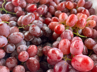 red grape with drops of wine