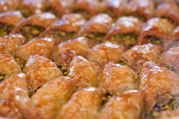 Enjoy the mouthwatering and delicious Baklava Slices that come with a delightful Pistachio Topping